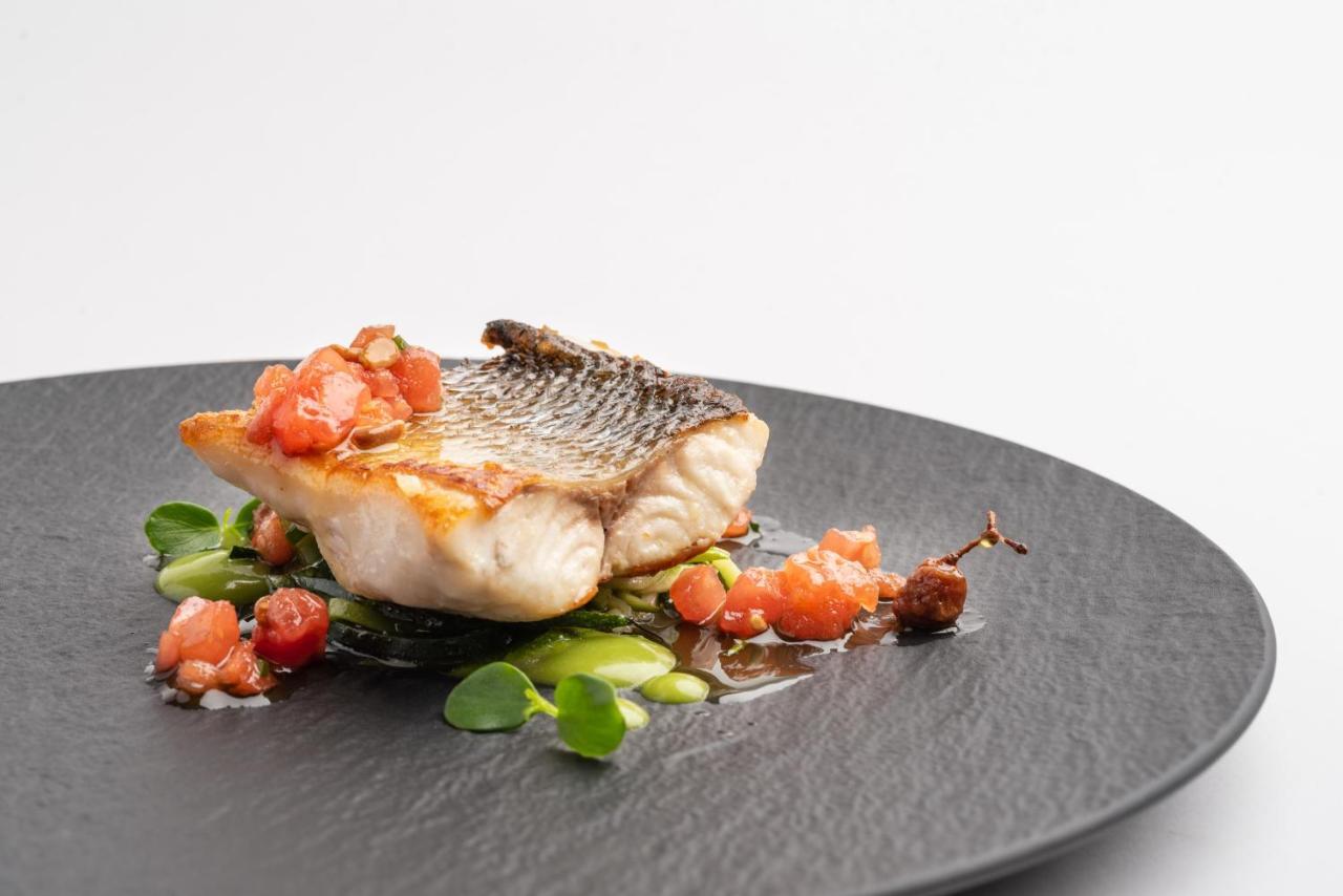 Eurostars Hotel De La Reconquista Oviedo Kültér fotó A prepared fillet of grouper